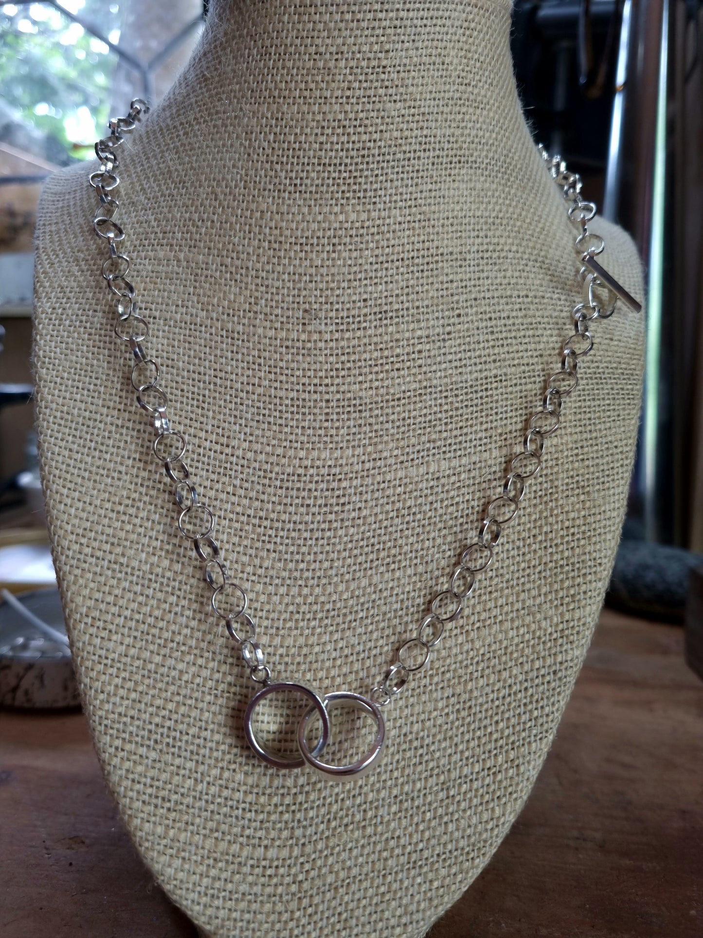 Interlinked ring necklace